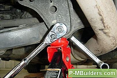 3 Signos de que el brazo de control de un automóvil sale mal'Une Voiture Va Mal