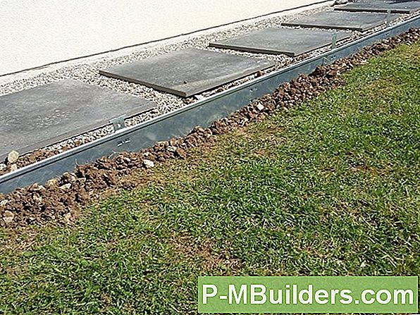 Hoe Een Betonnen Oprit Te Leggen