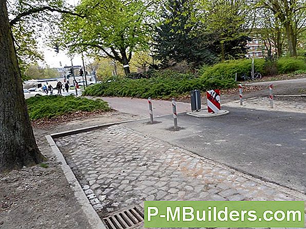 Kopfsteinpflaster-Gehweg Gegen Schotter Oder Beton
